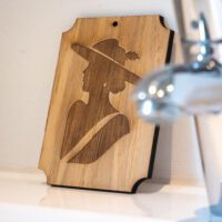 Graveret piktogram - mand og dame